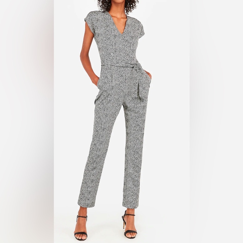 Express printed V-neck sash tie waist jumpsuit. Size S
